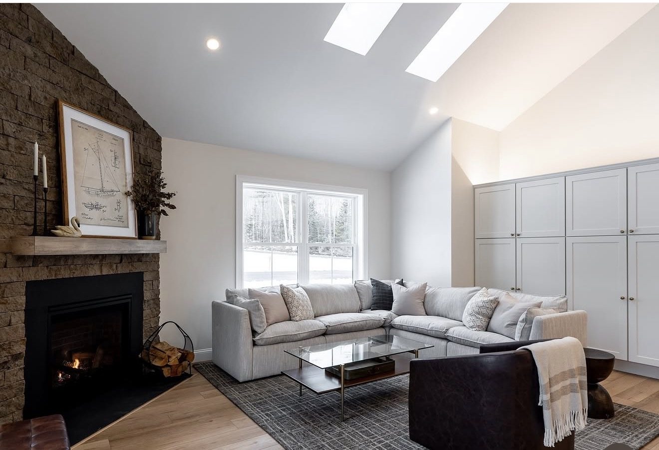 Vaulted living room in Hampton, New Hampshire finished and painted by J&B Drywall & Paint