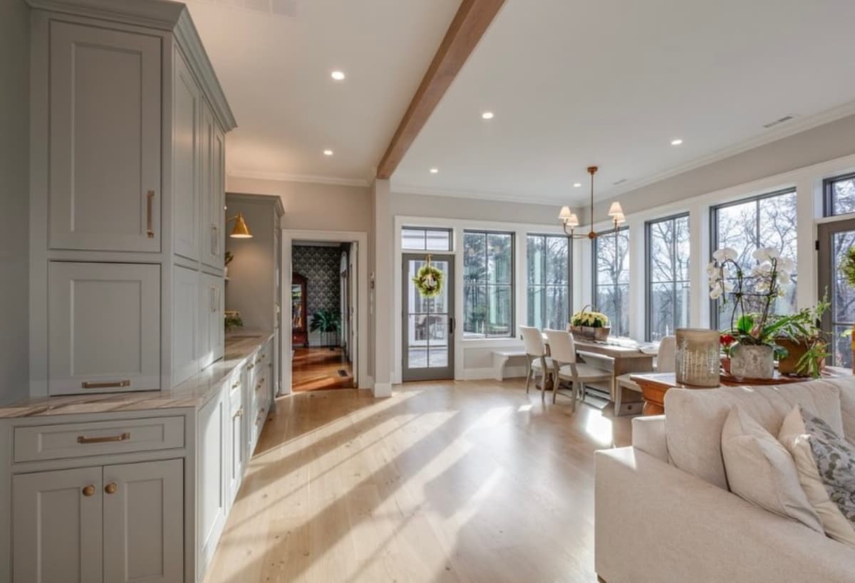 Living area with built-in cabinetry painted