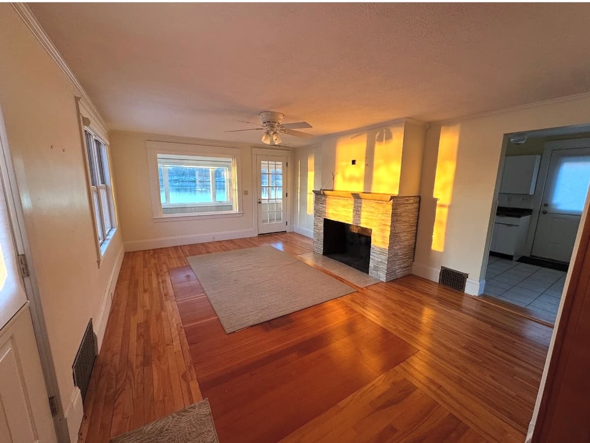 Living room with fireplace surround detail work